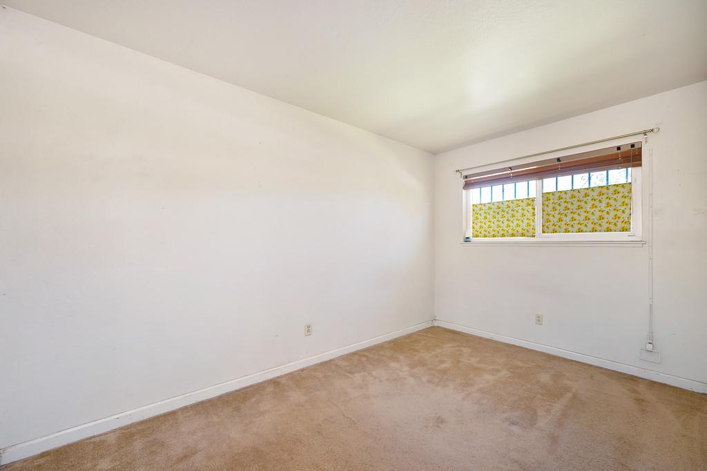7580 Bellini Way Sacramento, CA 95828 - Photo 24 of 34 an empty room with windows
