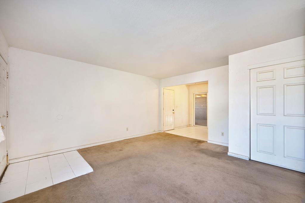 7580 Bellini Way Sacramento, CA 95828 - Photo 9 of 34 an empty room with closet