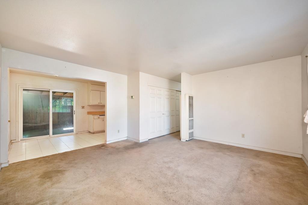 7580 Bellini Way Sacramento, CA 95828 - Photo 10 of 34 an empty room with closet and windows