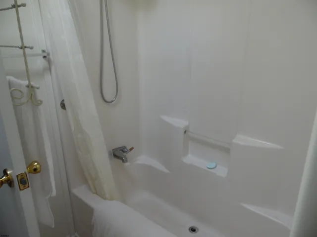 a close view of a bathtub in bathroom