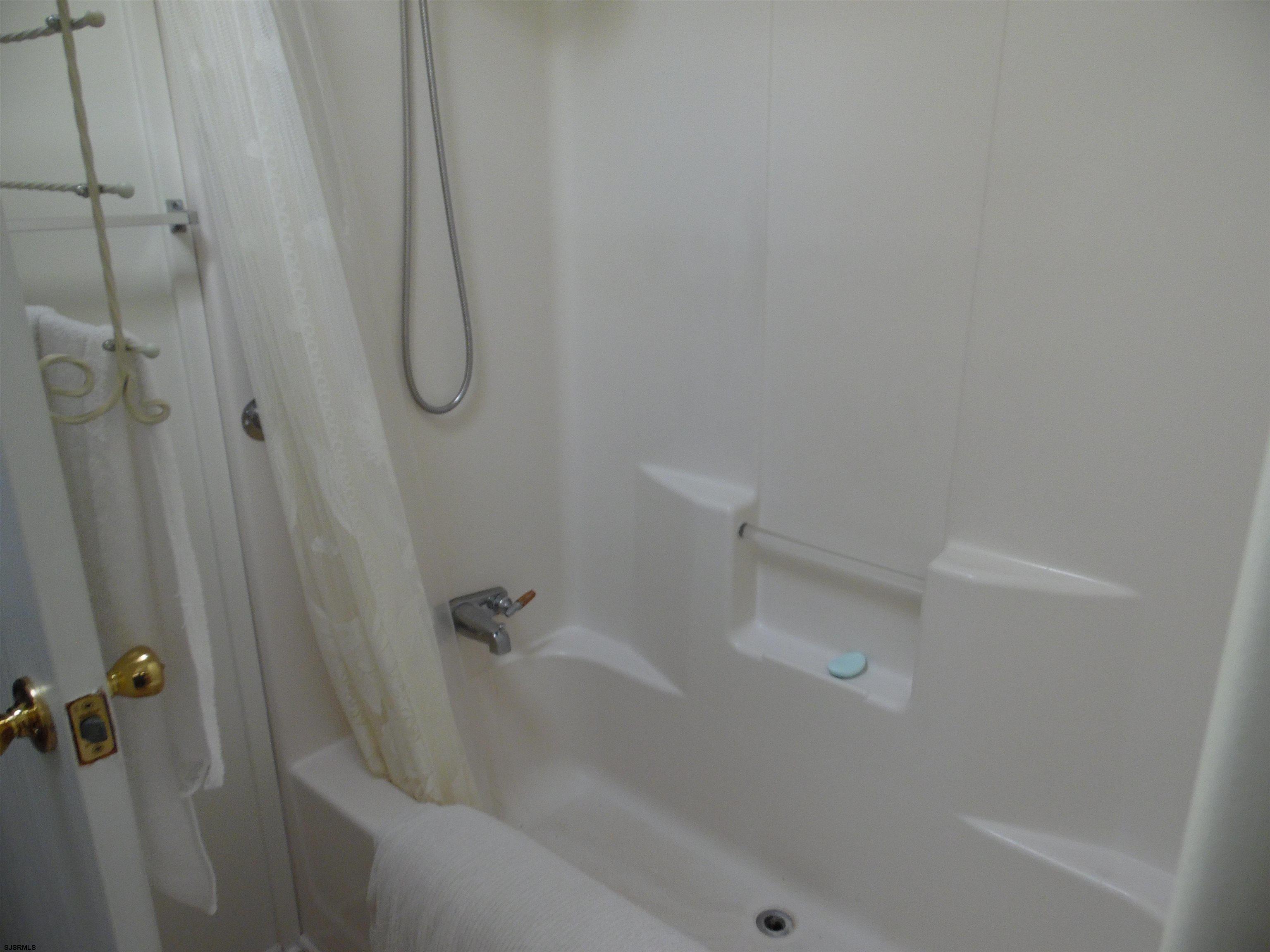 82 Elm Street Absecon, NJ 08205 - Photo 9 of 19 a close view of a bathtub in bathroom