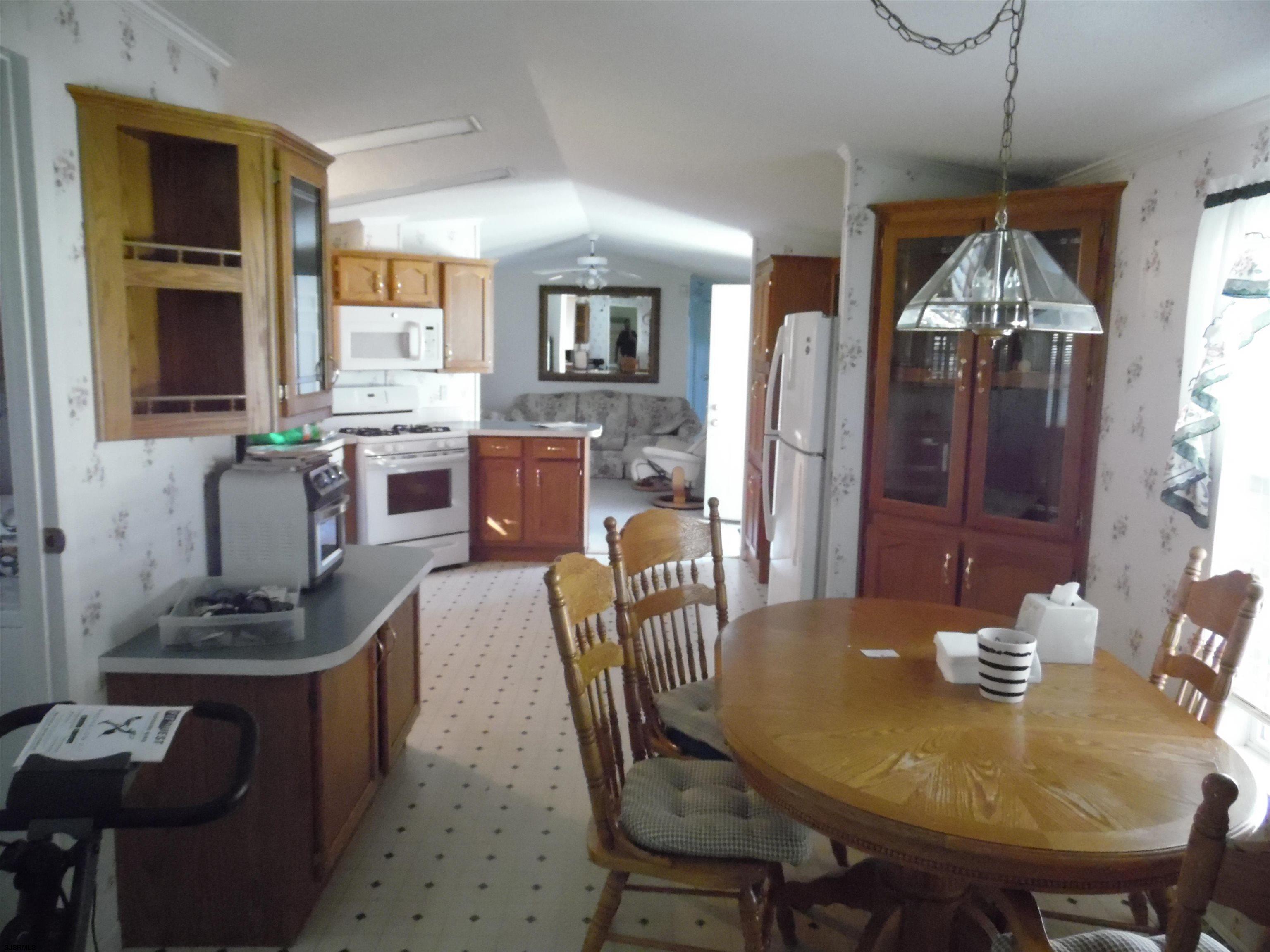 82 Elm Street Absecon, NJ 08205 - Photo 10 of 19 a view of a dining room with furniture