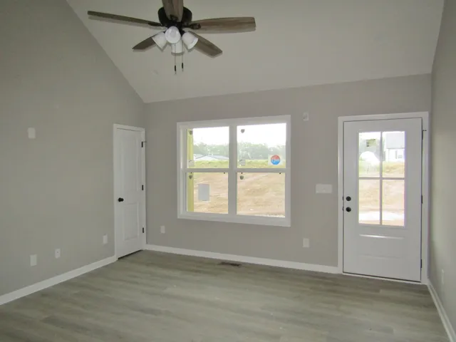 a view of an empty room with a window