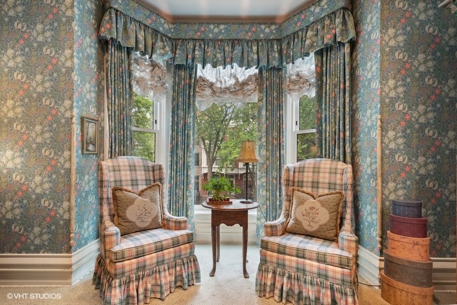 59 East Elm Street Chicago, IL 60611 - Photo 15 of 27 a living room with furniture and a large window with outer view
