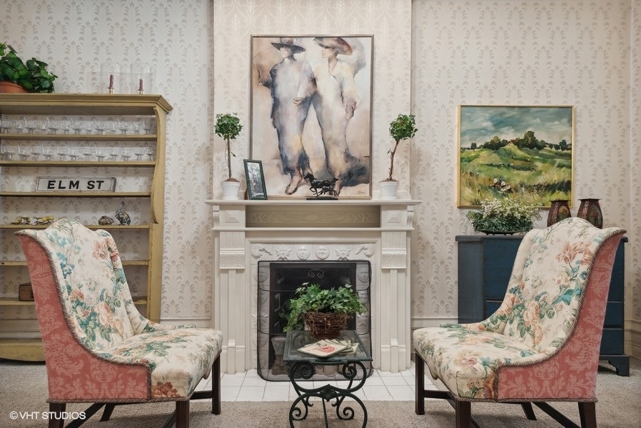 59 East Elm Street Chicago, IL 60611 - Photo 7 of 27 a living room with furniture and a fireplace