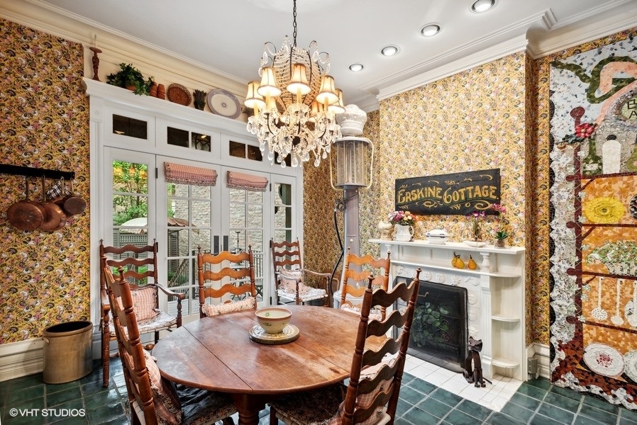59 East Elm Street Chicago, IL 60611 - Photo 8 of 27 a view of a dining room with furniture and chandelier