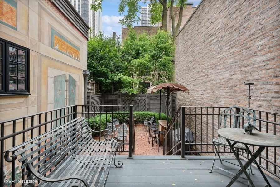 59 East Elm Street Chicago, IL 60611 - Photo 9 of 27 a view of a balcony with chairs
