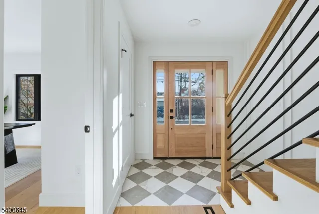 a view of an entryway with a rug
