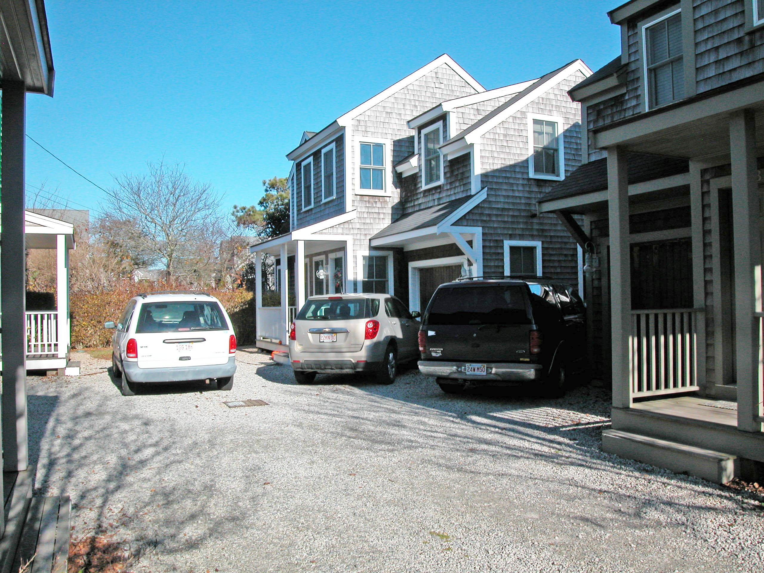 20 Nobadeer Farm Road, Unit EACH Nantucket, MA 02554 - Photo 6 of 10 a car parked in front of a building