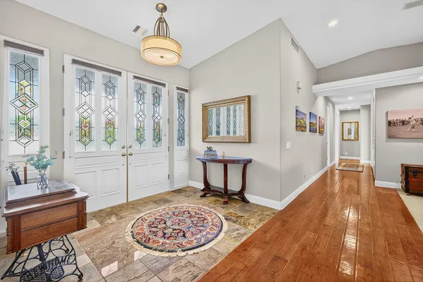 a living room with furniture and a table