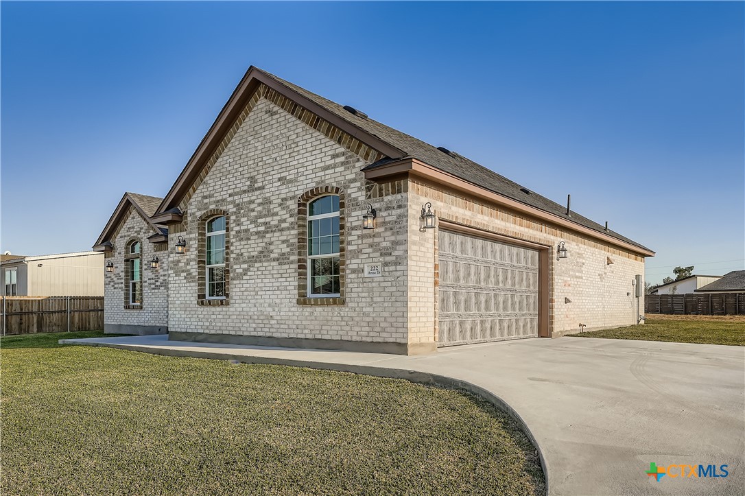 222 Arosa Drive Elgin, TX 78621 - Photo 5 of 40 a view of backyard of house