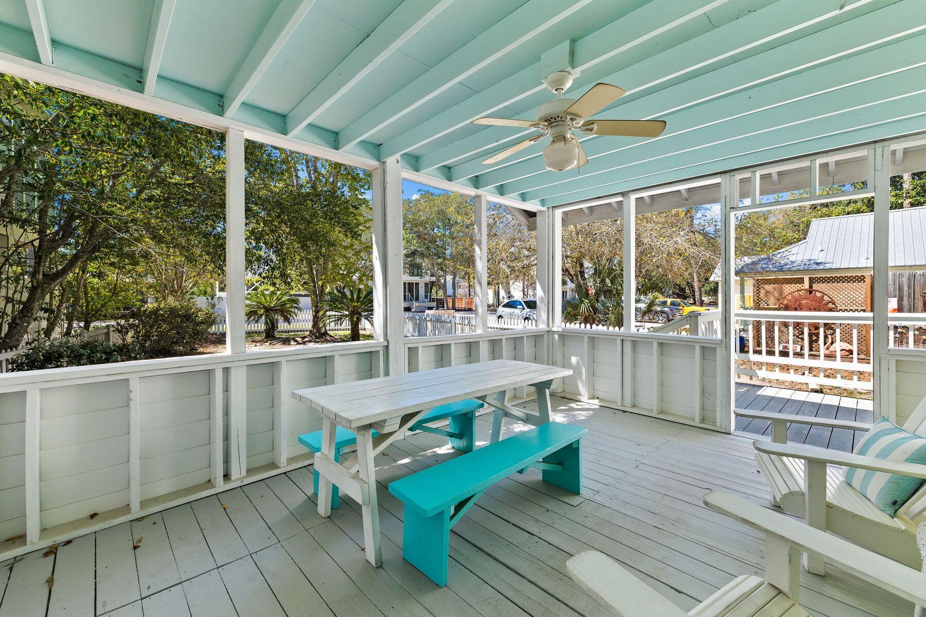 147 Magnolia Street Santa Rosa Beach, FL 32459 - Photo 2 of 33 a balcony with furniture and a large window