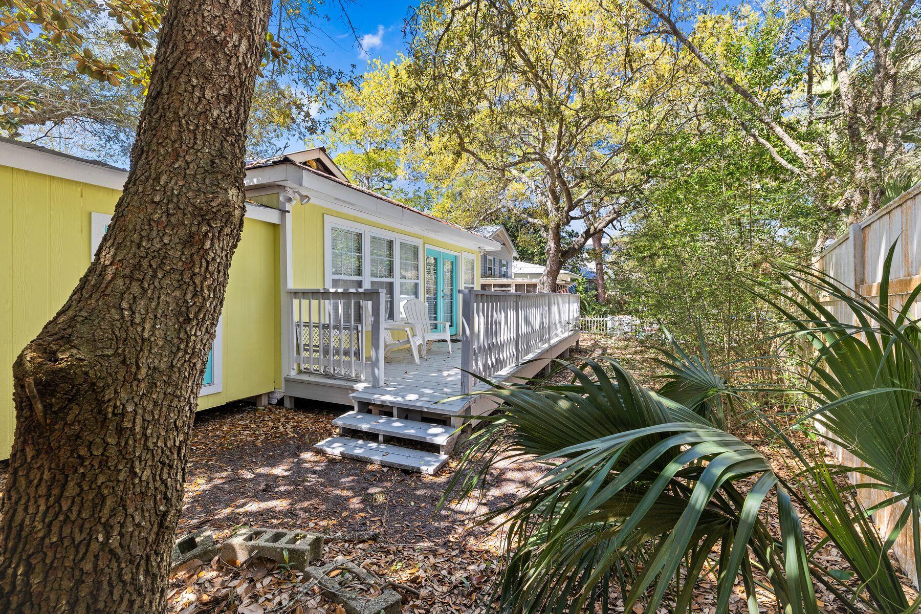 147 Magnolia Street Santa Rosa Beach, FL 32459 - Photo 29 of 33 a view of a house with a garden