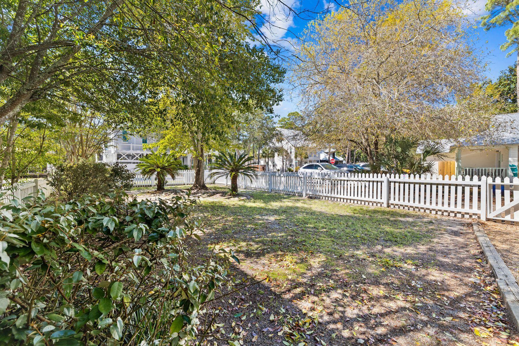 147 Magnolia Street Santa Rosa Beach, FL 32459 - Photo 32 of 33 a view of a park with large trees
