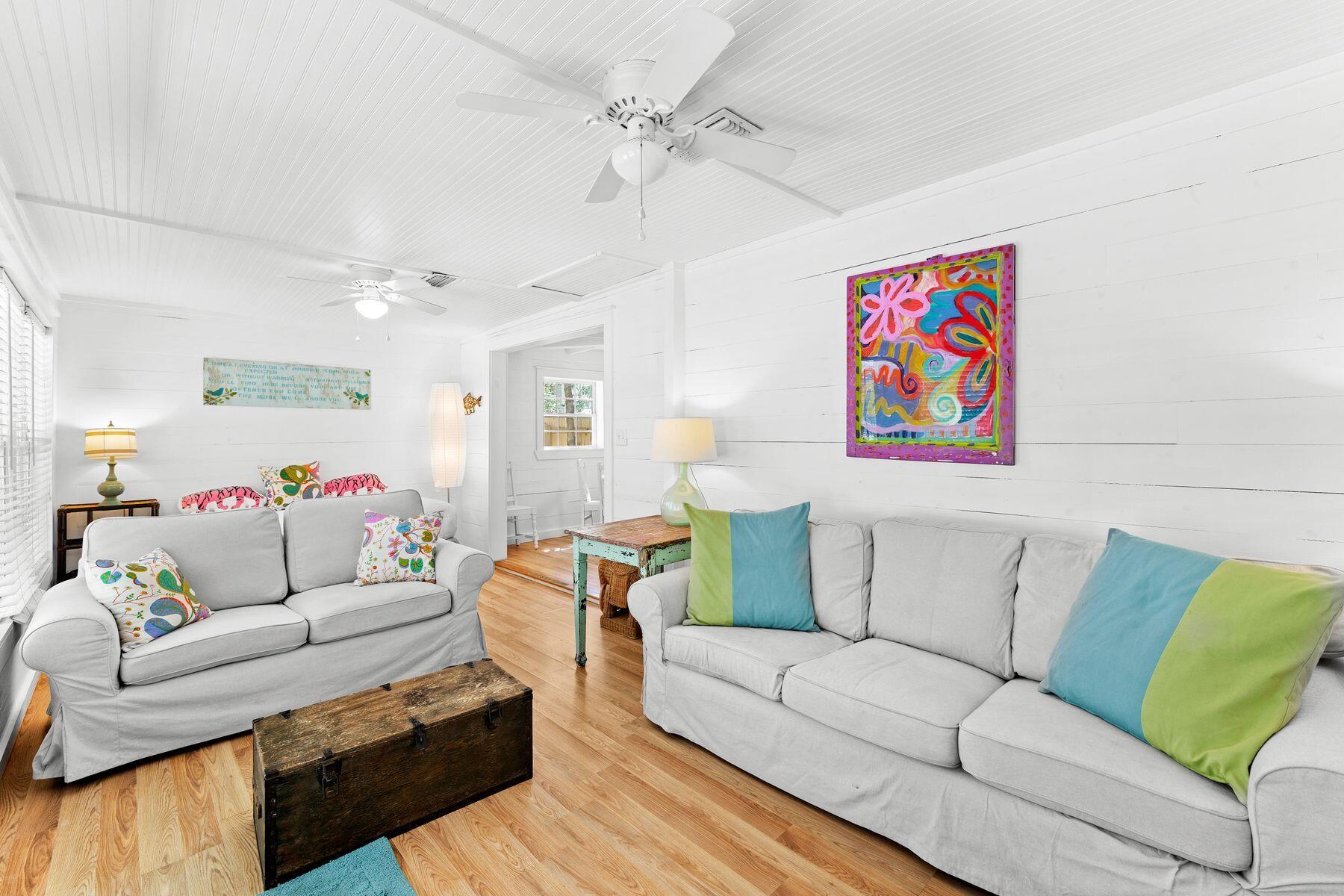 147 Magnolia Street Santa Rosa Beach, FL 32459 - Photo 5 of 33 a living room with furniture and a couch