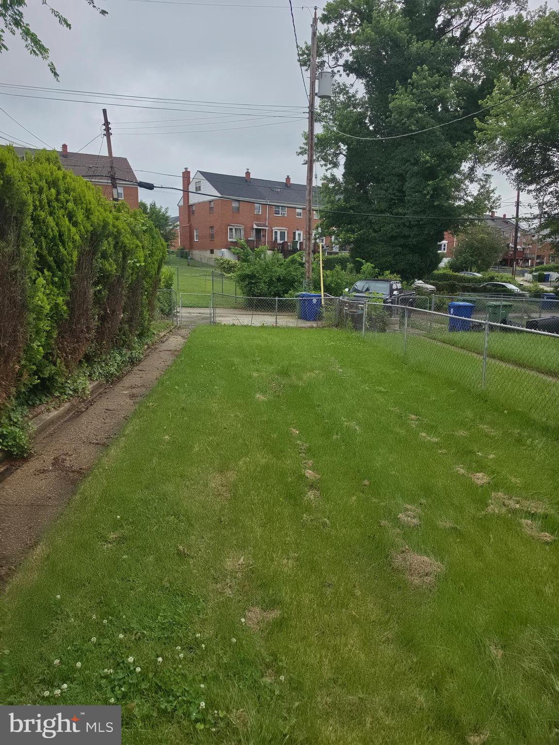 2028 Hillenwood Road Baltimore, MD 21239 - Photo 8 of 18 a view of a stadium that has a big yard