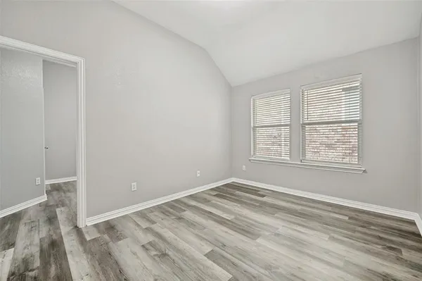 a view of a room with a large window