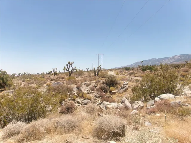 a view of lake with mountain