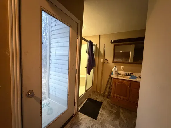 a view of a storage and utility room