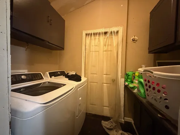 a kitchen that has a sink and a stove