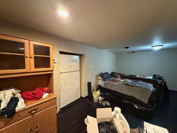 a bed room with a bed and furniture