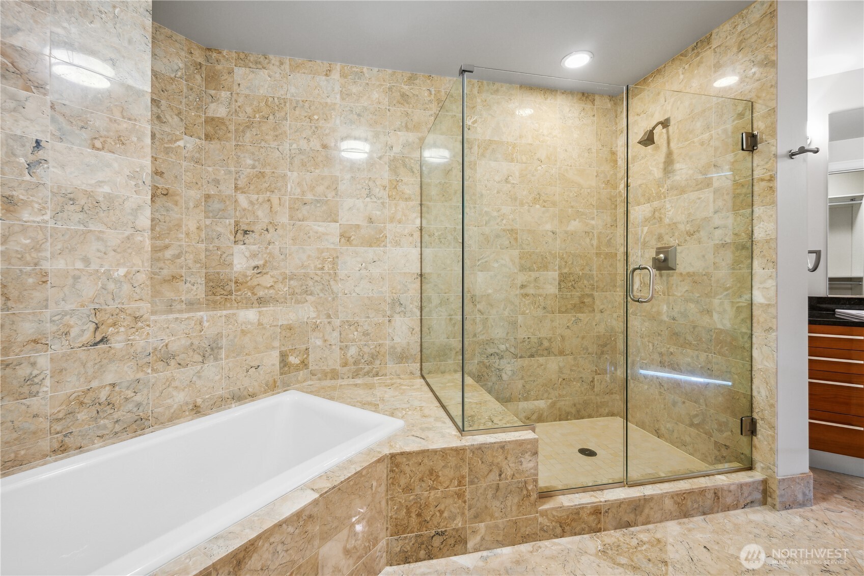 1920 4th Avenue, Unit 2301 Seattle, WA 98101 - Photo 16 of 40 a bathroom with a shower and a bathtub