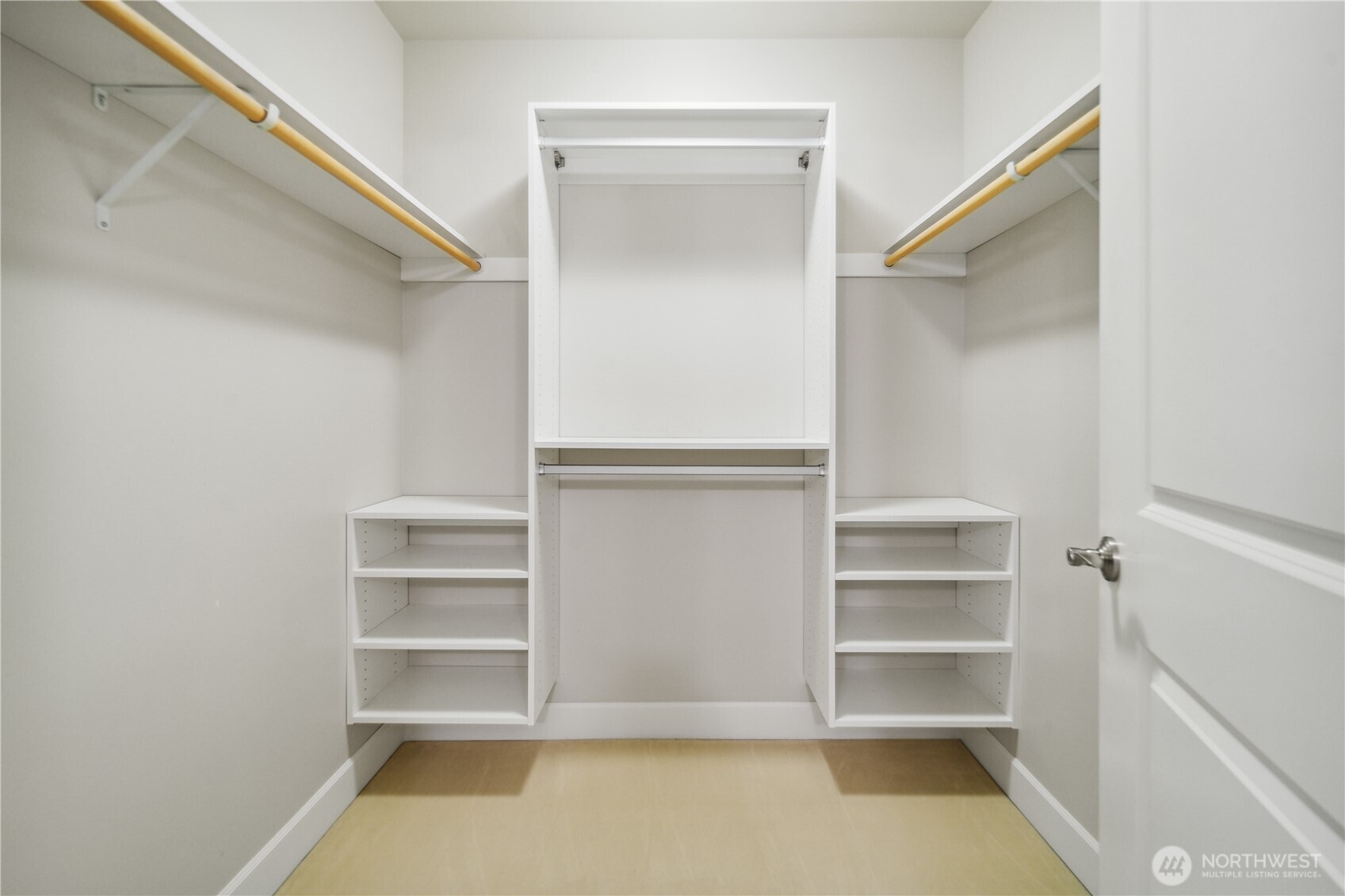 1920 4th Avenue, Unit 2301 Seattle, WA 98101 - Photo 17 of 40 a view of walk in closet with empty racks