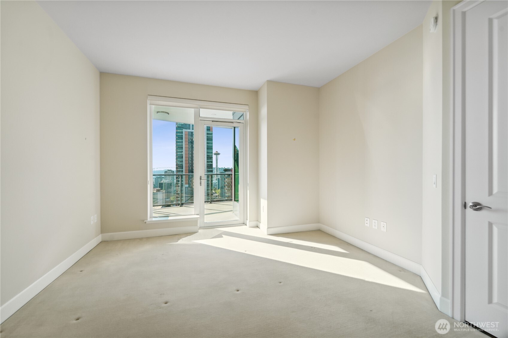 1920 4th Avenue, Unit 2301 Seattle, WA 98101 - Photo 23 of 40 an empty room with a window