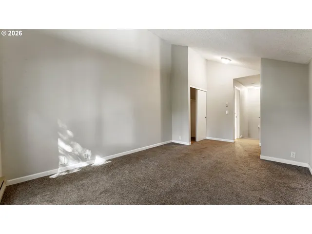 a bathroom with a sink vanity mirror and toilet
