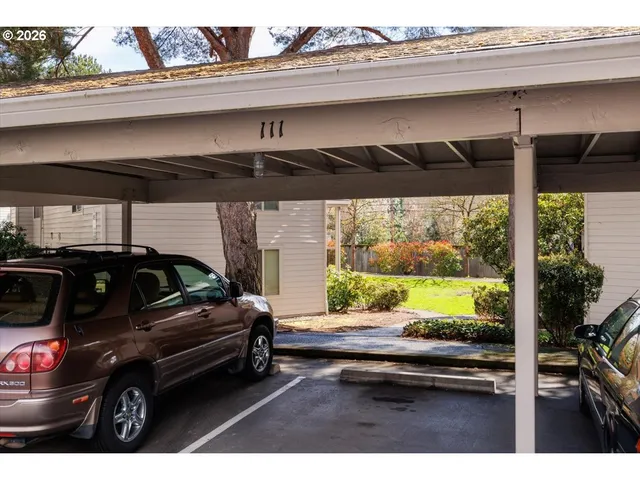 a swimming pool with barbeque oven outdoor seating