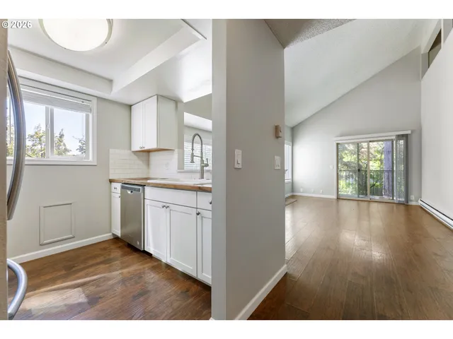 a open hall with wooden floor and floors
