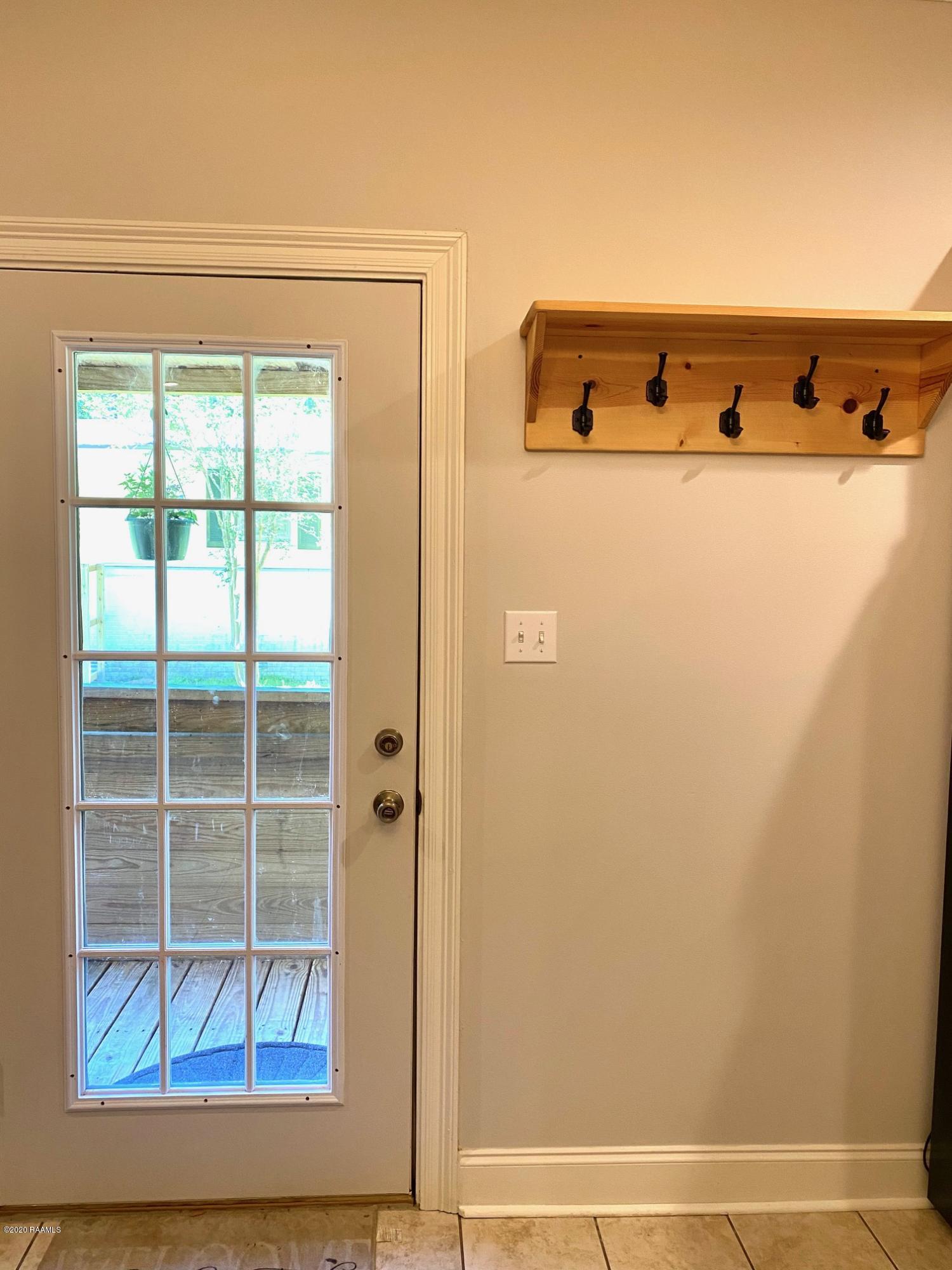100 Attakapas Road Lafayette, LA 70501 - Photo 19 of 25 Door to Backyard