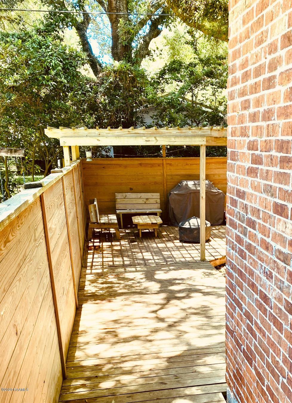 100 Attakapas Road Lafayette, LA 70501 - Photo 22 of 25 Walk way to Back yard