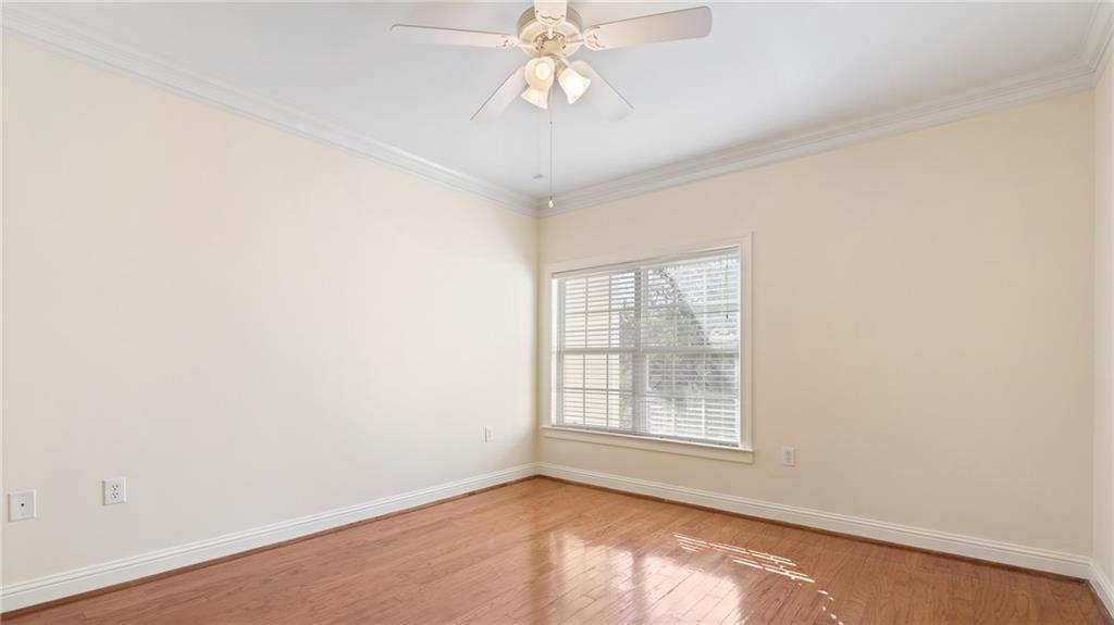 3309 Village Boulevard Southeast Rome, GA 30161 - Photo 16 of 38 an empty room with windows and fan