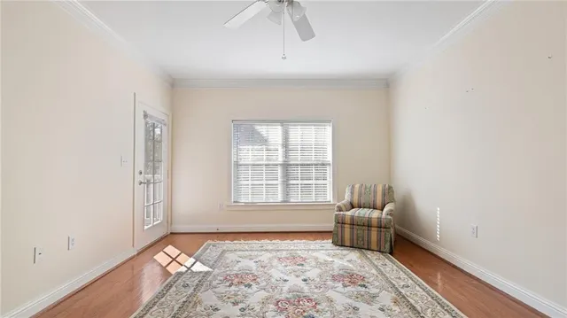 a room that has a bed and a window in it