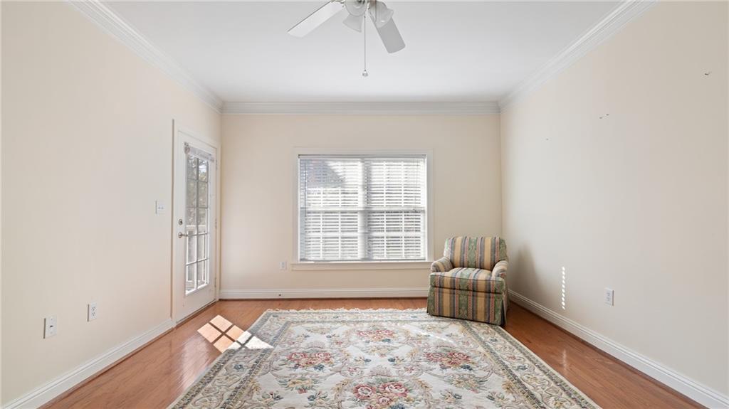 3309 Village Boulevard Southeast Rome, GA 30161 - Photo 2 of 38 a room that has a bed and a window in it