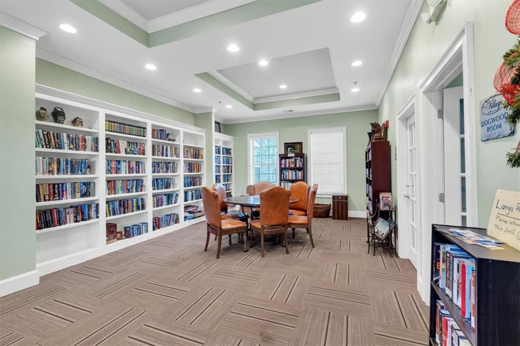 3309 Village Boulevard Southeast Rome, GA 30161 - Photo 33 of 38 a living room with furniture and a large window
