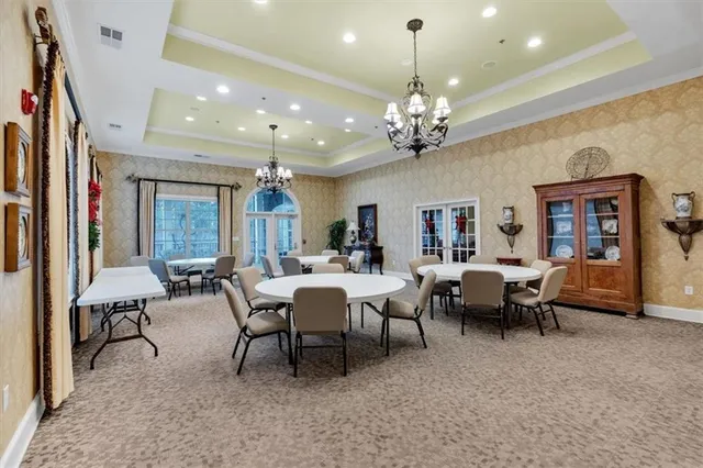 a kitchen with a sink cabinets and window