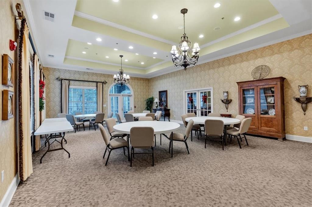 3309 Village Boulevard Southeast Rome, GA 30161 - Photo 36 of 38 a view of a dining room with furniture window and wooden floor