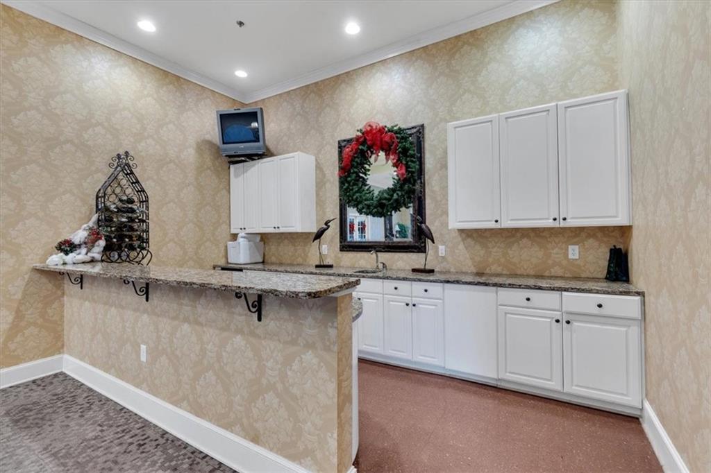 3309 Village Boulevard Southeast Rome, GA 30161 - Photo 37 of 38 a kitchen with a sink cabinets and window