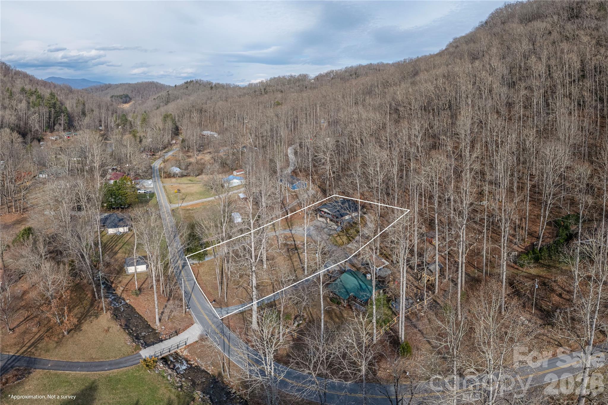 3415 Conleys Creek Road Whittier, NC 28789 - Photo 23 of 27 a view of a houses with a mountain