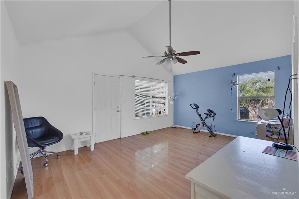 3301 Princeton Avenue McAllen, TX 78504 - Photo 14 of 21 a view of a workspace with furniture and a window