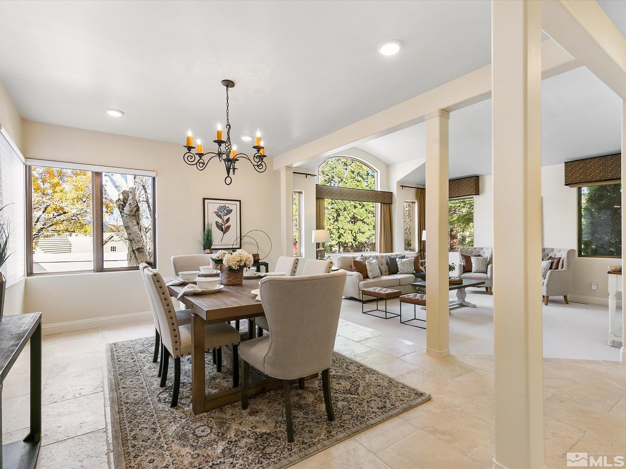 100 Sawbuck Road Reno, NV 89519 - Photo 14 of 40 a view of a dining room with furniture window and wooden floor