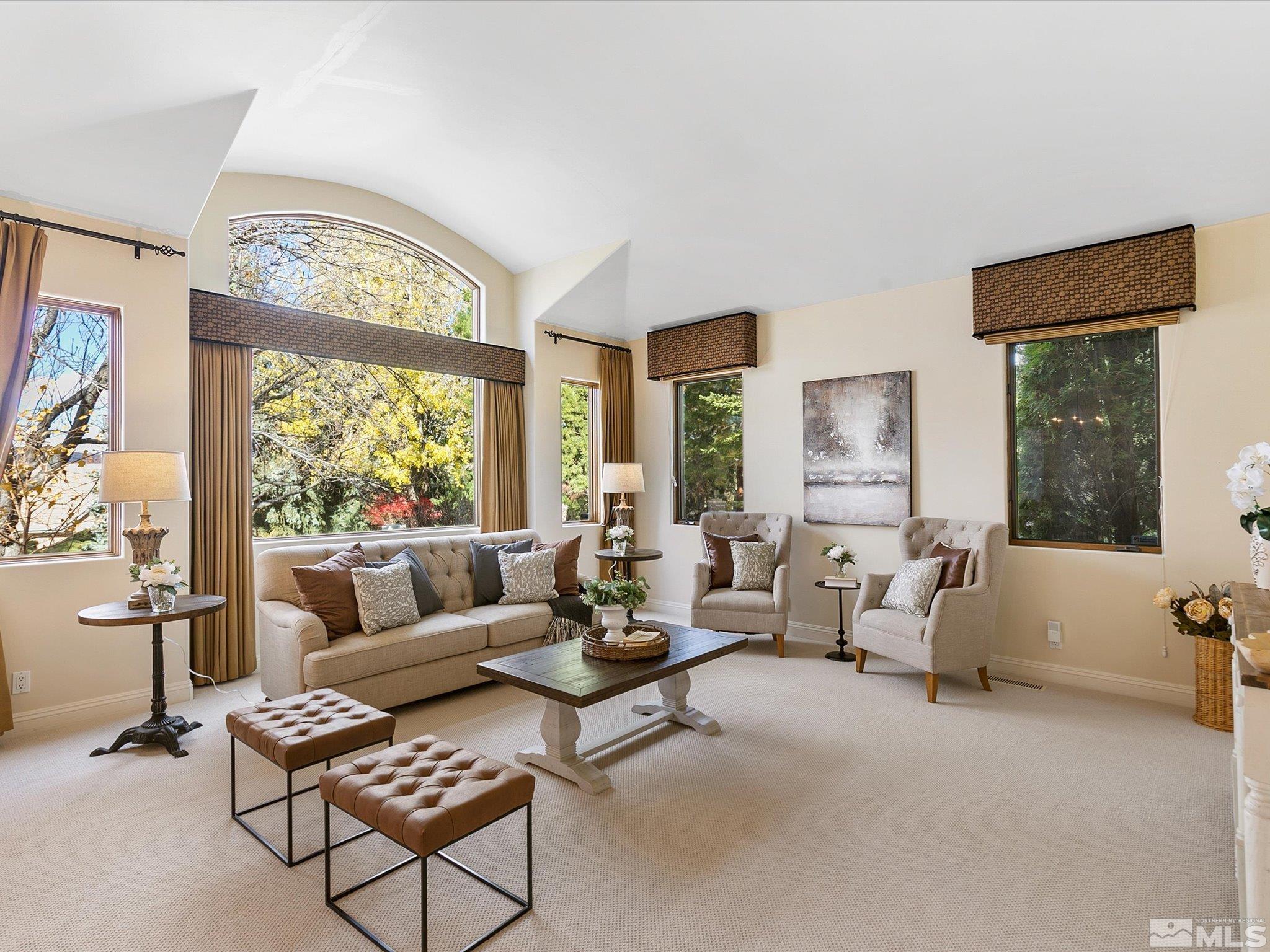 100 Sawbuck Road Reno, NV 89519 - Photo 15 of 40 a living room with furniture and a large window