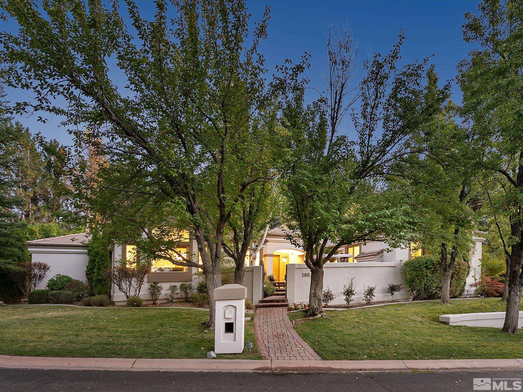 100 Sawbuck Road Reno, NV 89519 - Photo 2 of 40 a front view of a house with a yard