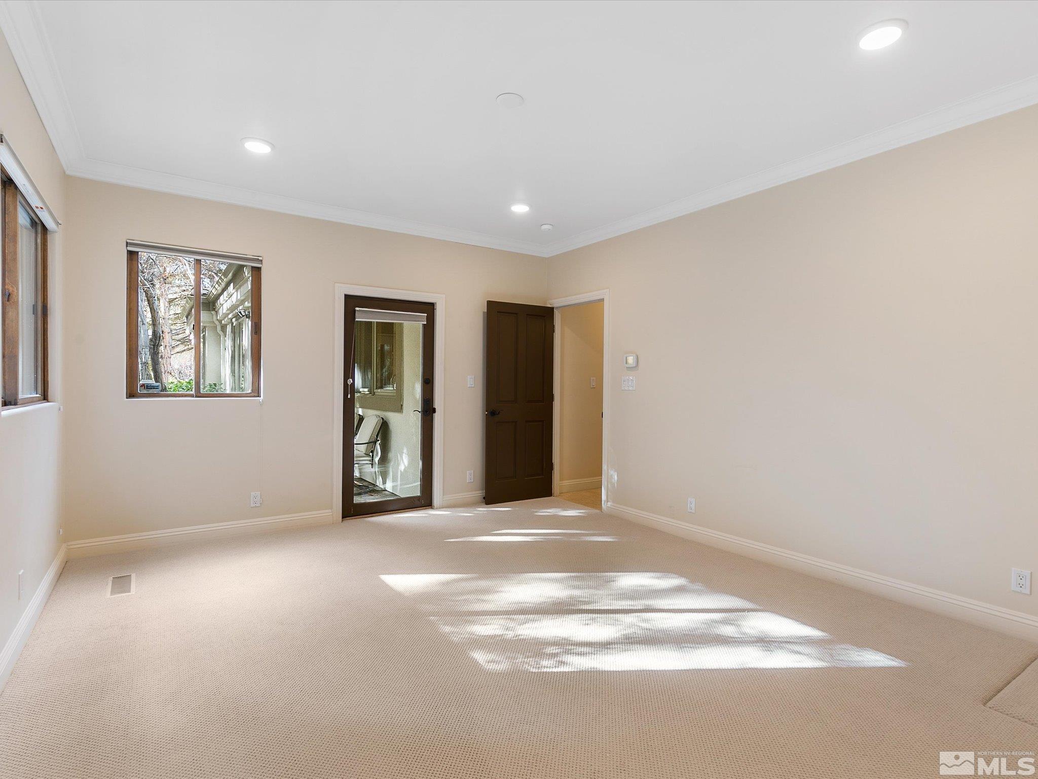 100 Sawbuck Road Reno, NV 89519 - Photo 30 of 40 a view of an empty room with closet and a window