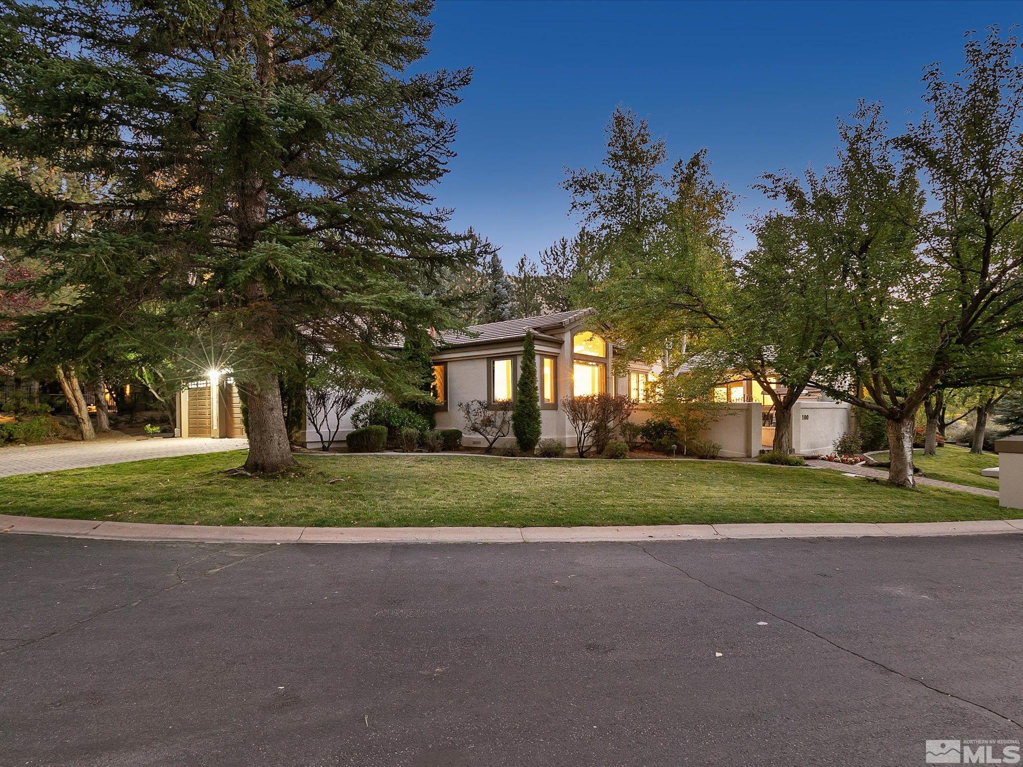 100 Sawbuck Road Reno, NV 89519 - Photo 3 of 40 a view of a house with a yard