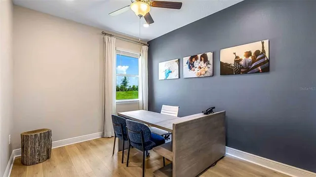 a view of a livingroom with furniture