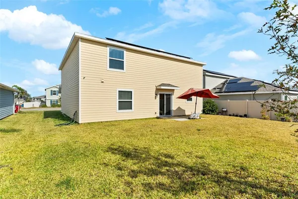 a house view with a outdoor space