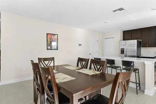 a view of a dining room with furniture